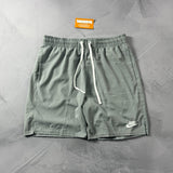 Shorts Tactel Nike Club Flow - Cinza