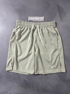 Shorts Tactel Nike Club Flow - Cinza Claro