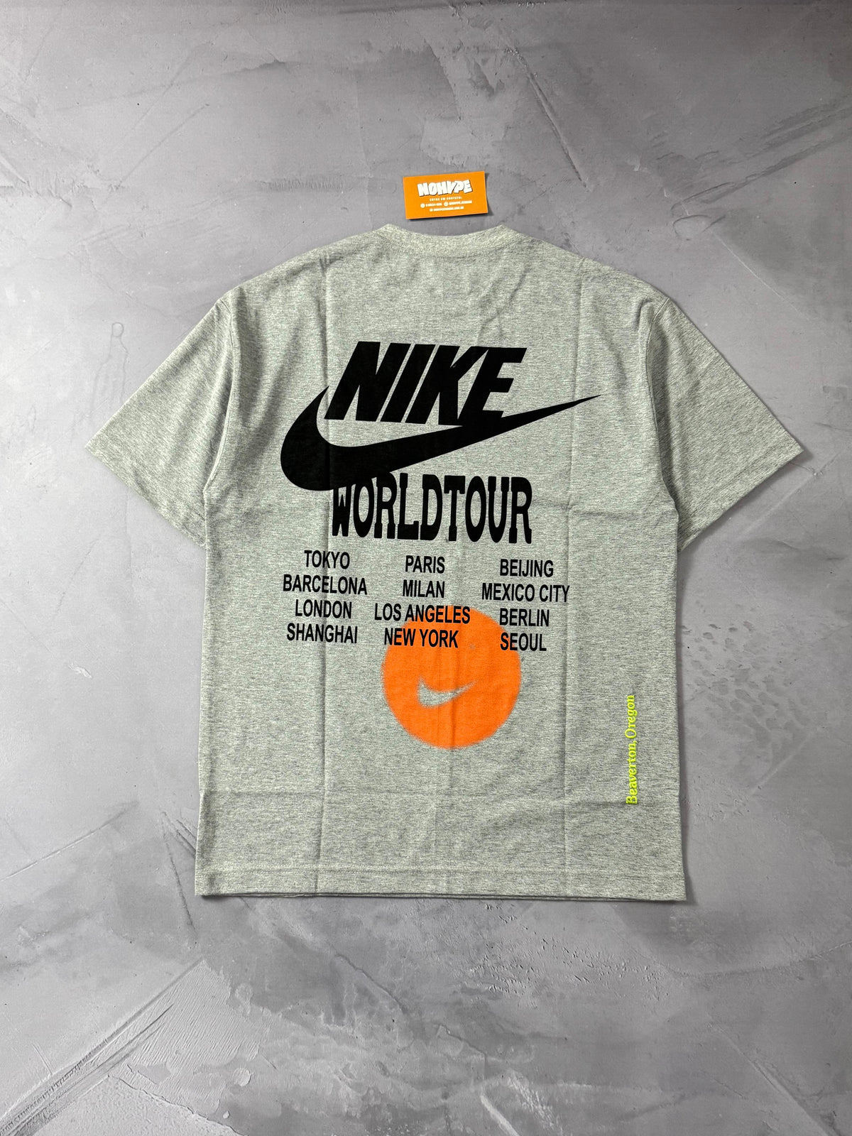 Camiseta Nike World Tour - Cinza