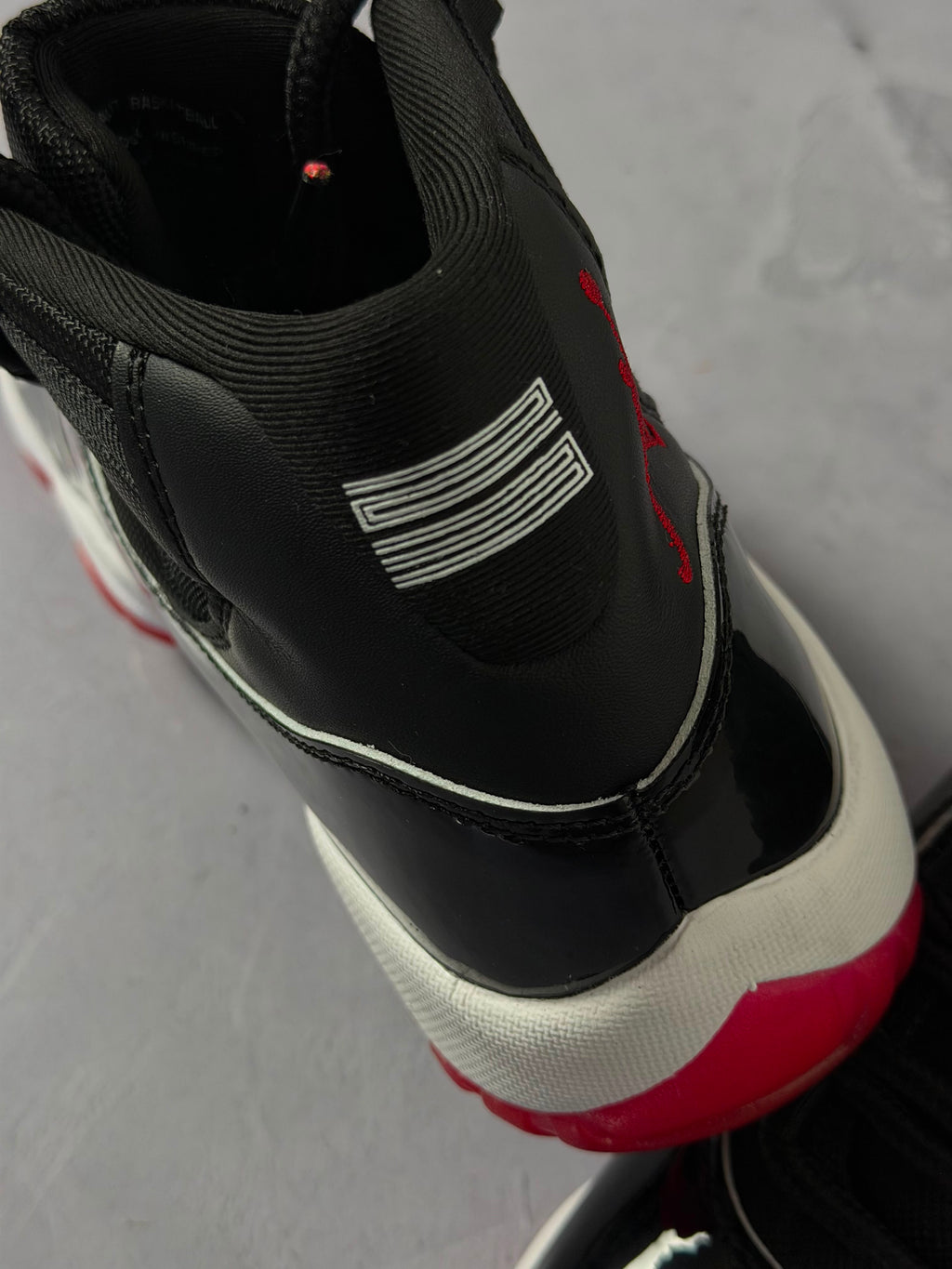 Tênis Nike Air Jordan 11 - Bred