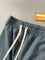 Shorts Tactel Nike Club - Azul Petróleo