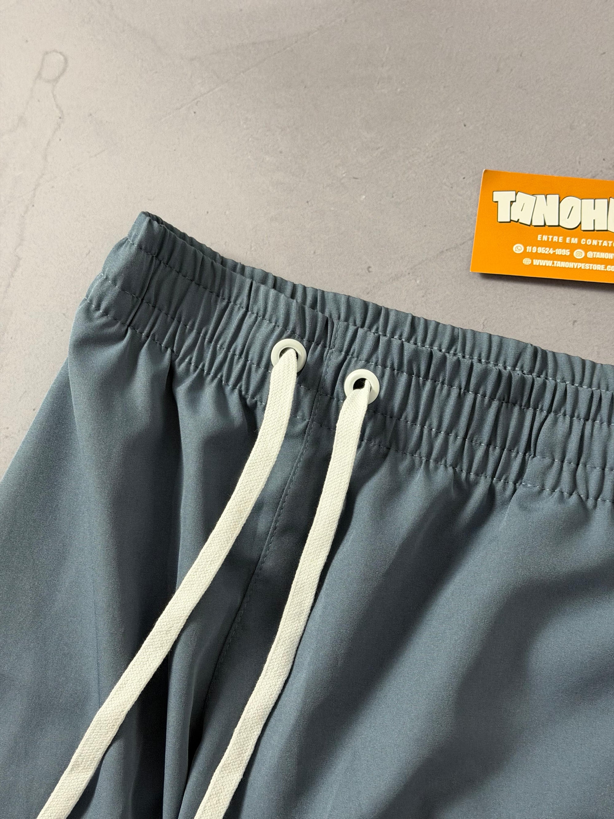 Shorts Tactel Nike Club - Azul Petróleo
