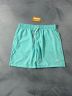 Shorts Tactel Nike Club Flow - Azul Turquesa