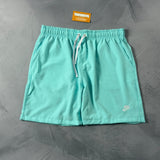 Shorts Tactel Nike Club Flow - Azul Turquesa