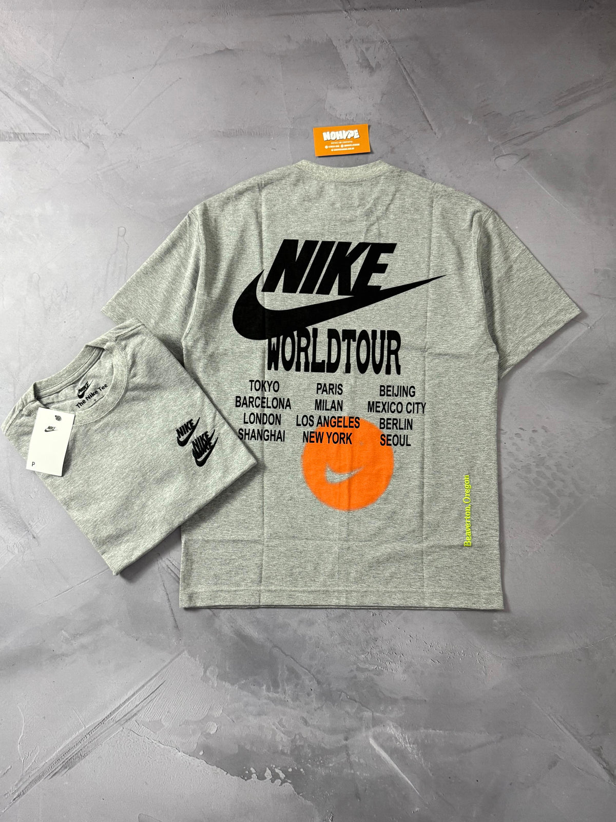 Camiseta Nike World Tour - Cinza
