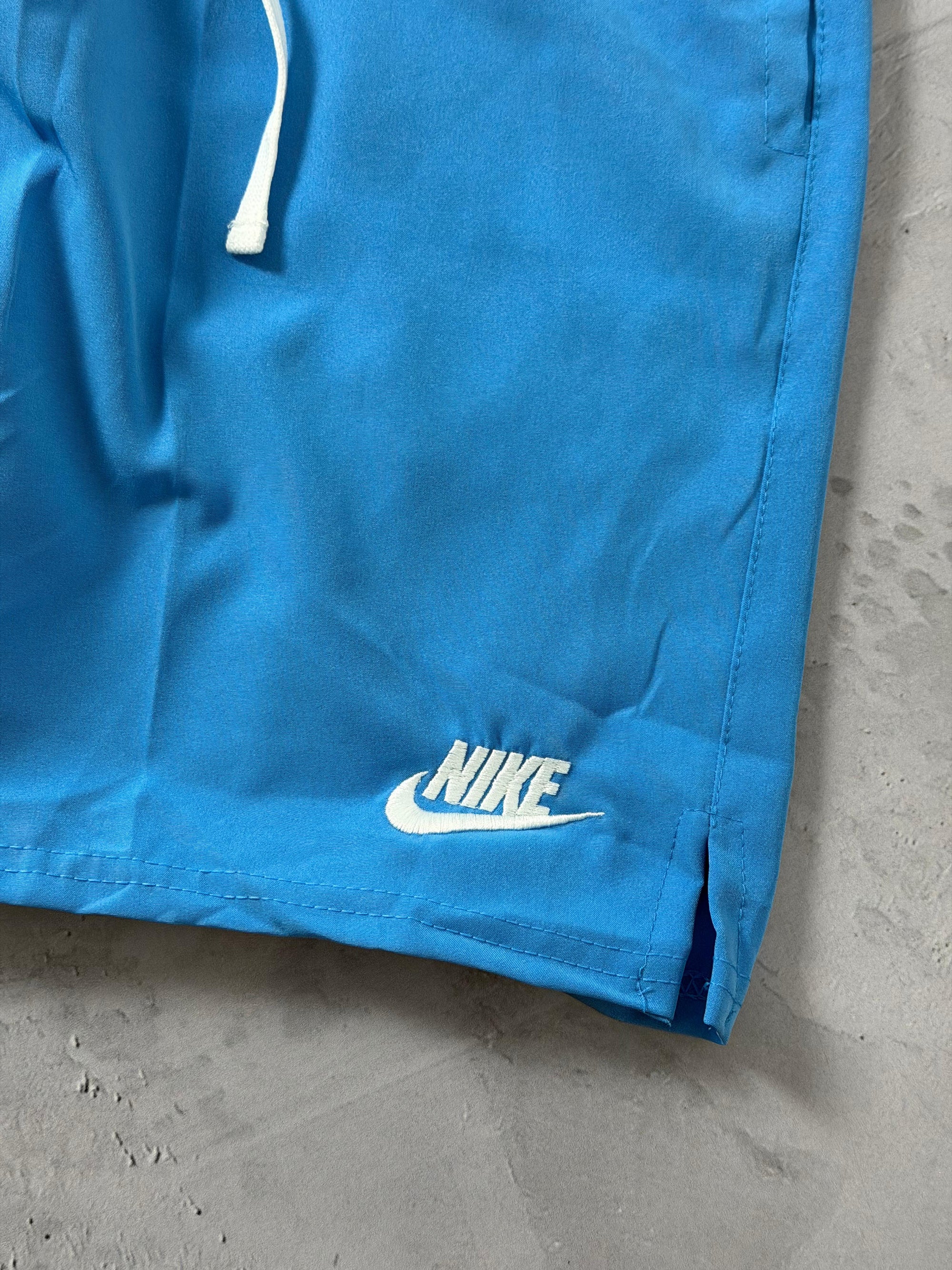 Shorts Tactel Nike Club Flow - Azul