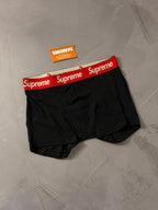 CUECA SUPREME - PRETA/VERMELHA