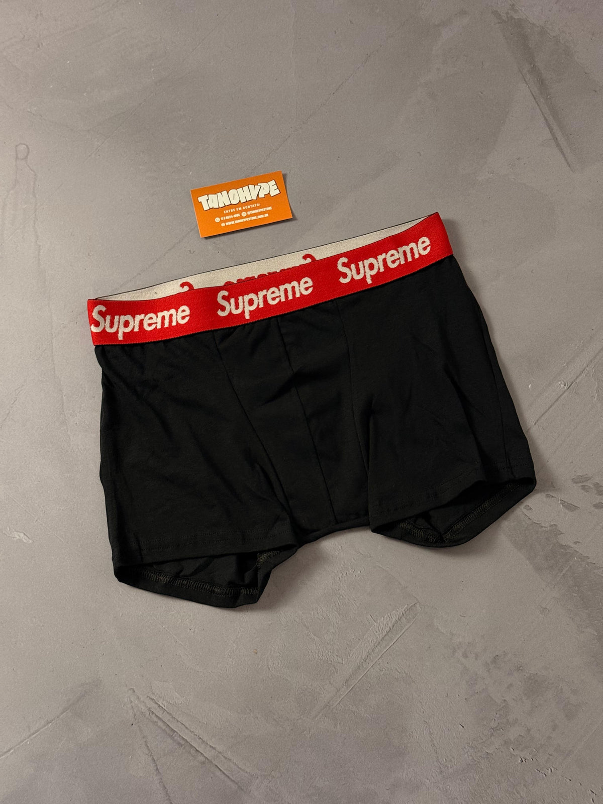 CUECA SUPREME - PRETA/VERMELHA