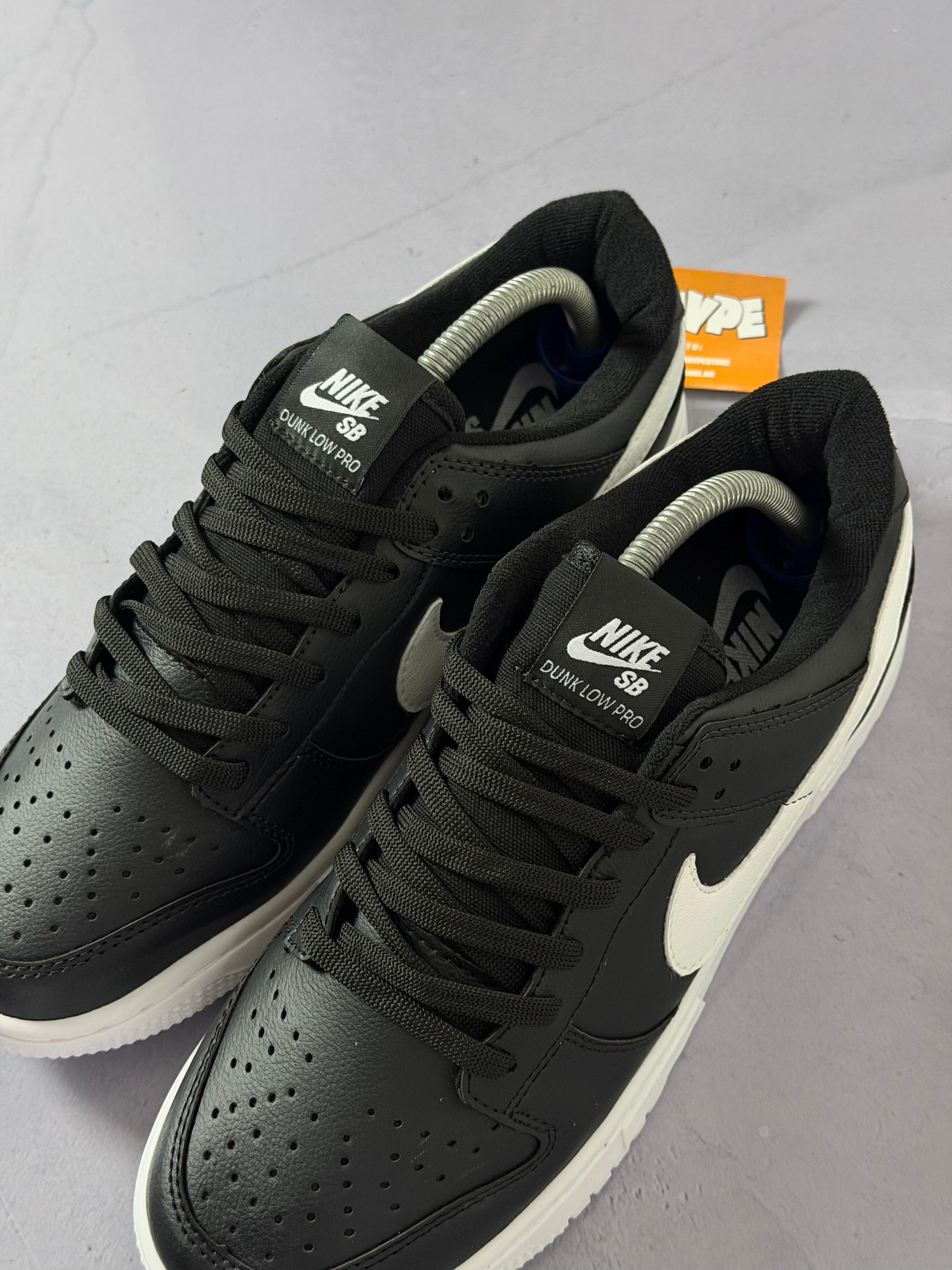 Tênis Nike Dunk Sb Low - Preto/Branco