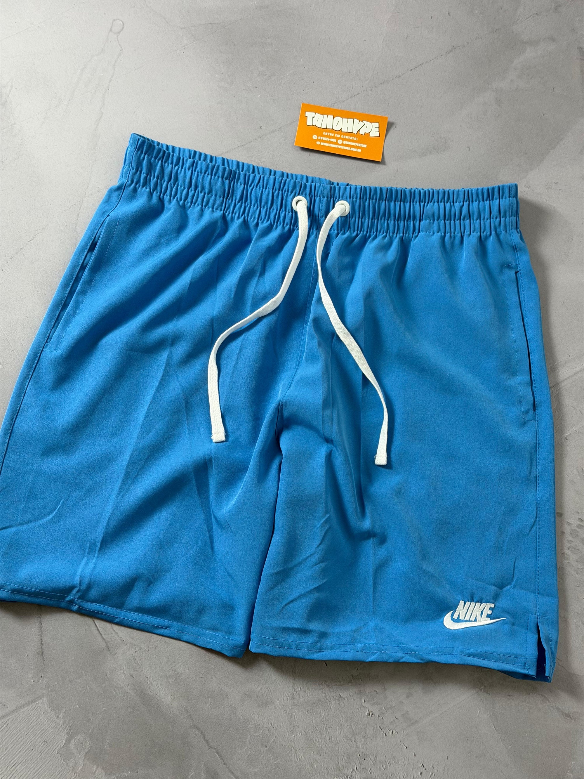 Shorts Tactel Nike Club Flow - Azul