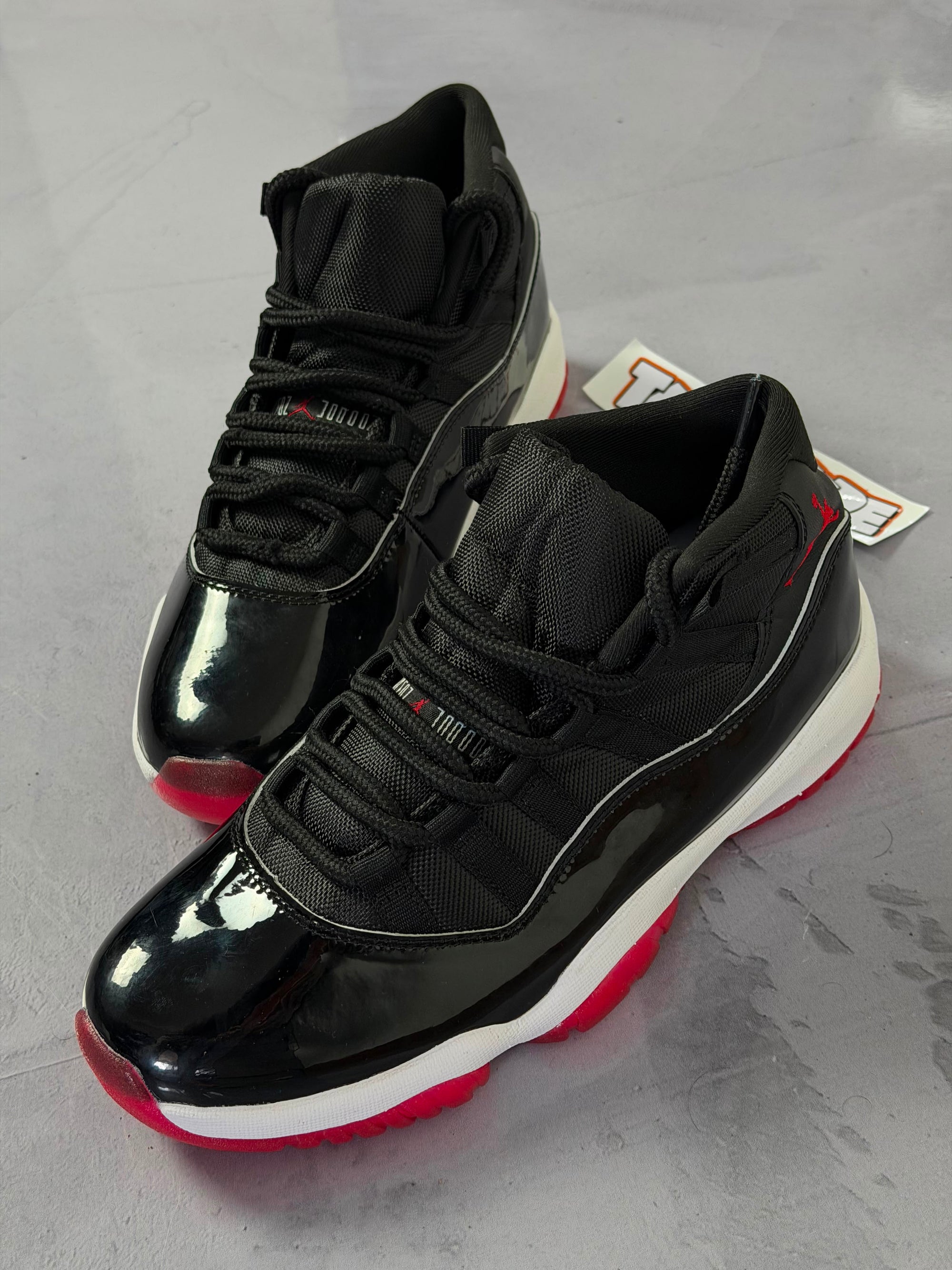 Tênis Nike Air Jordan 11 - Bred