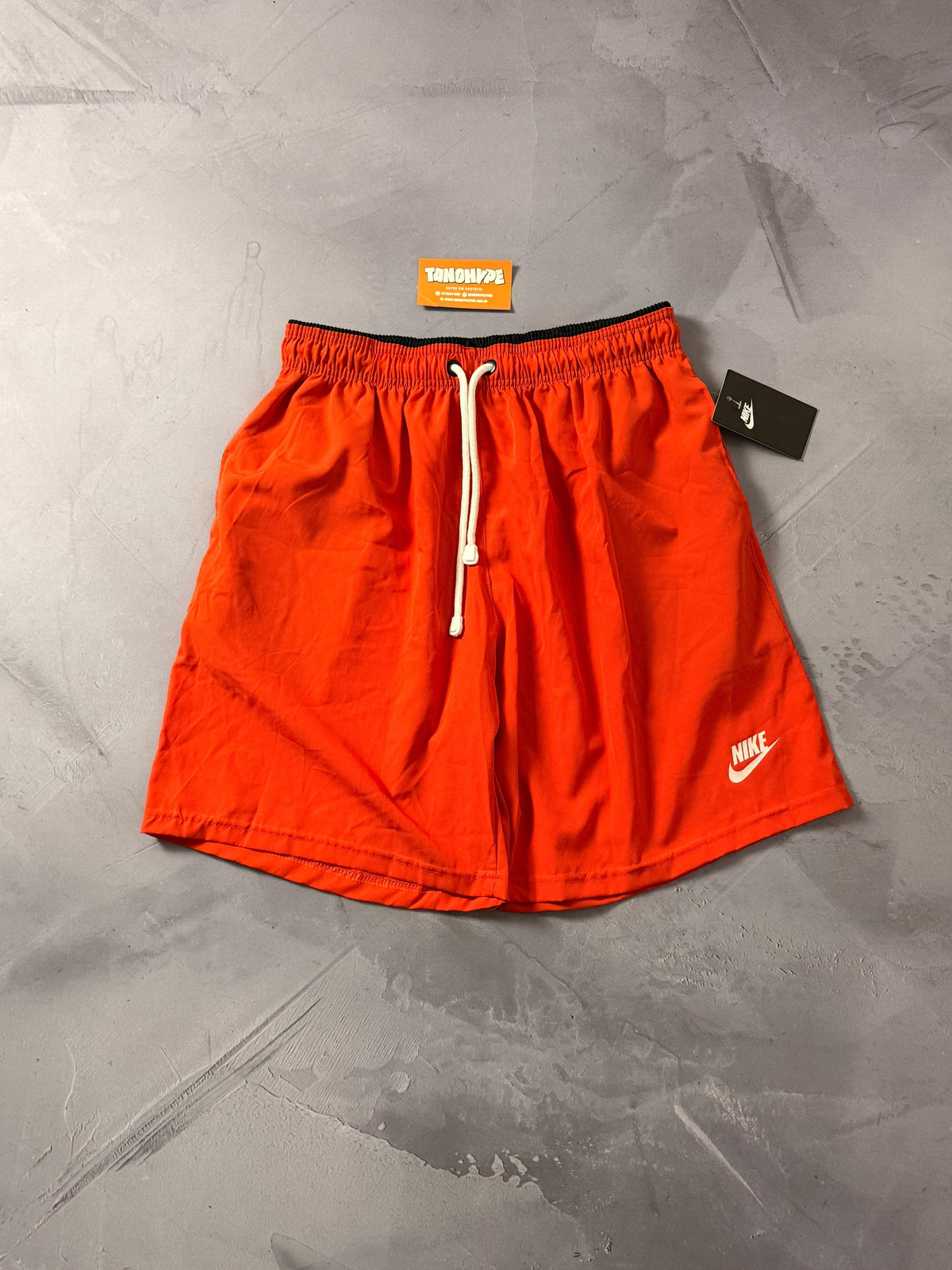 Shorts Tactel Nike Club - Laranja
