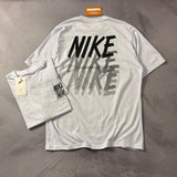 Camiseta Nike Repeat Fade - Branca