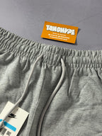 Shorts Moletom Nike Essentials - Cinza