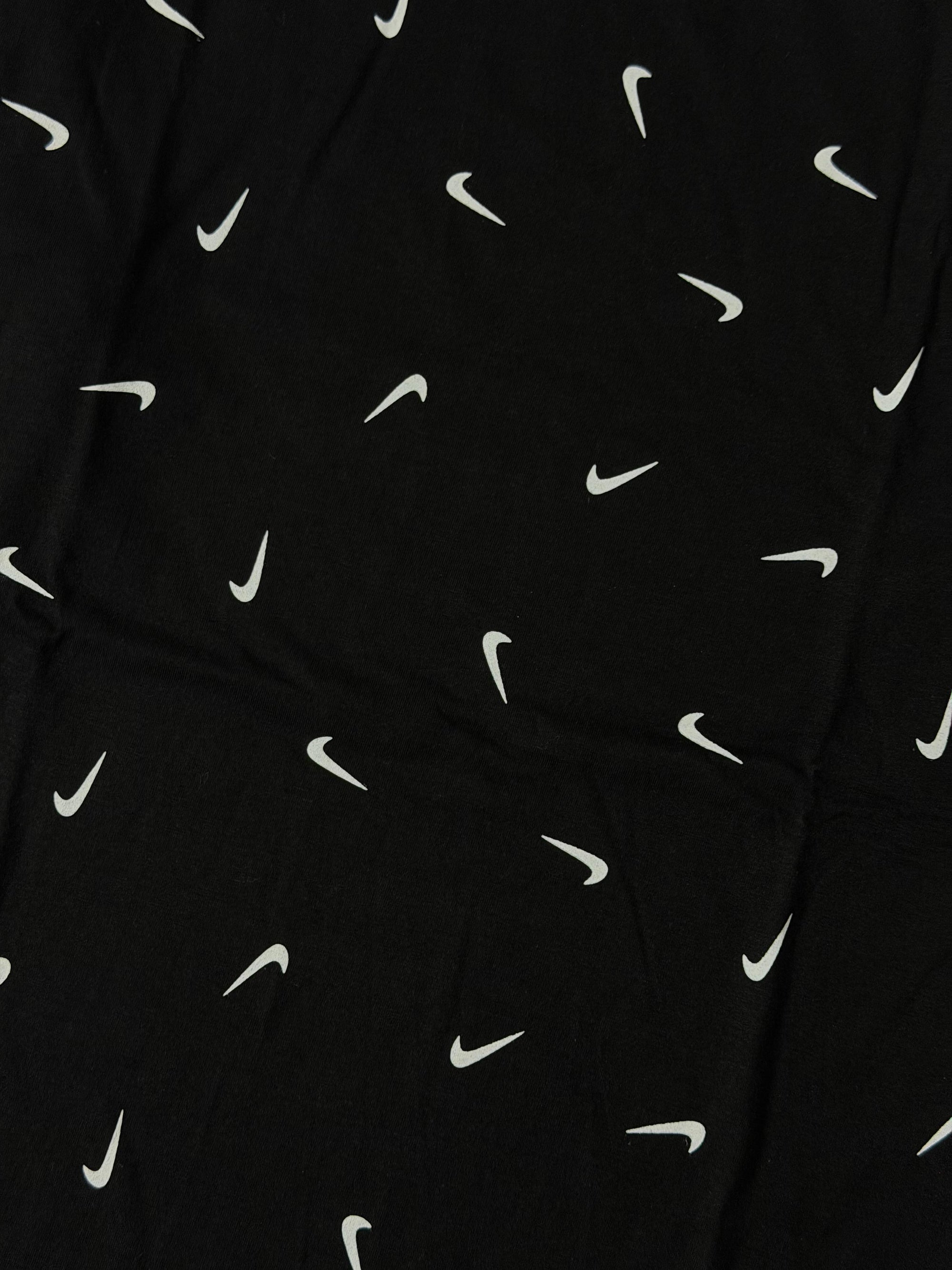 Camiseta Nike Chuva de Swoosh