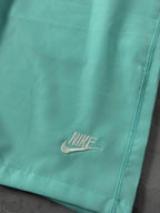 Shorts Tactel Nike Club Flow - Azul Turquesa