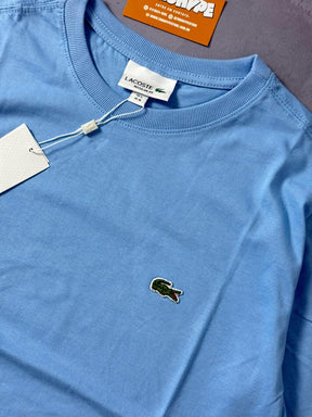 Camiseta Lacoste - Azul Bebê